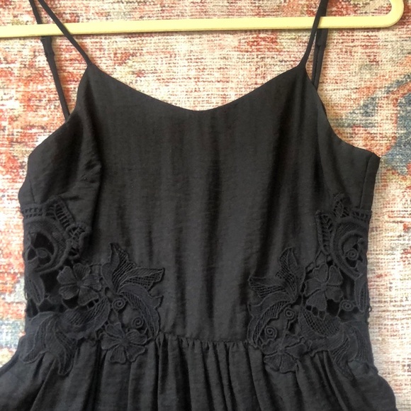 Dresses & Skirts - Black mini dress with floral lace cutouts